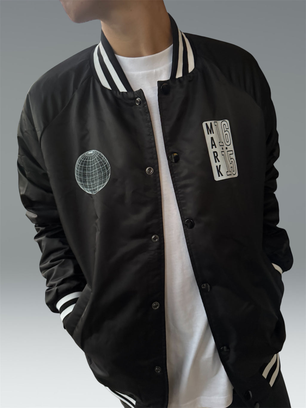 INTO THE WORLD VARSITY BOMBER JACKET