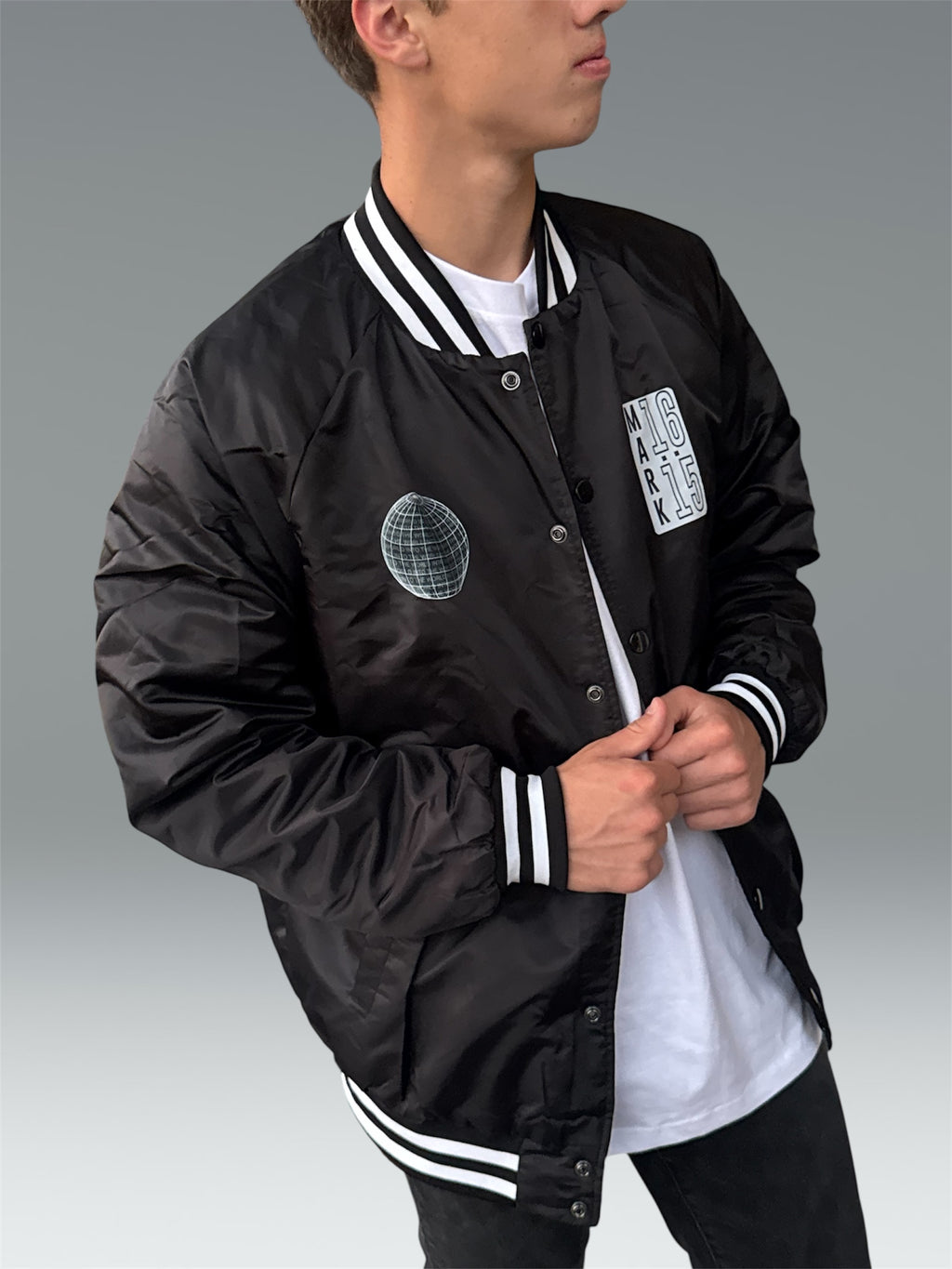 INTO THE WORLD VARSITY BOMBER JACKET