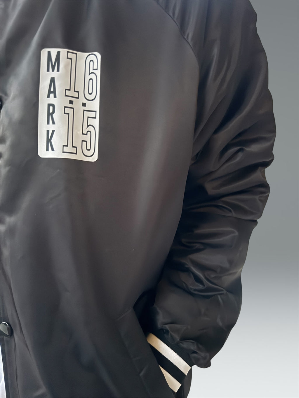 INTO THE WORLD VARSITY BOMBER JACKET