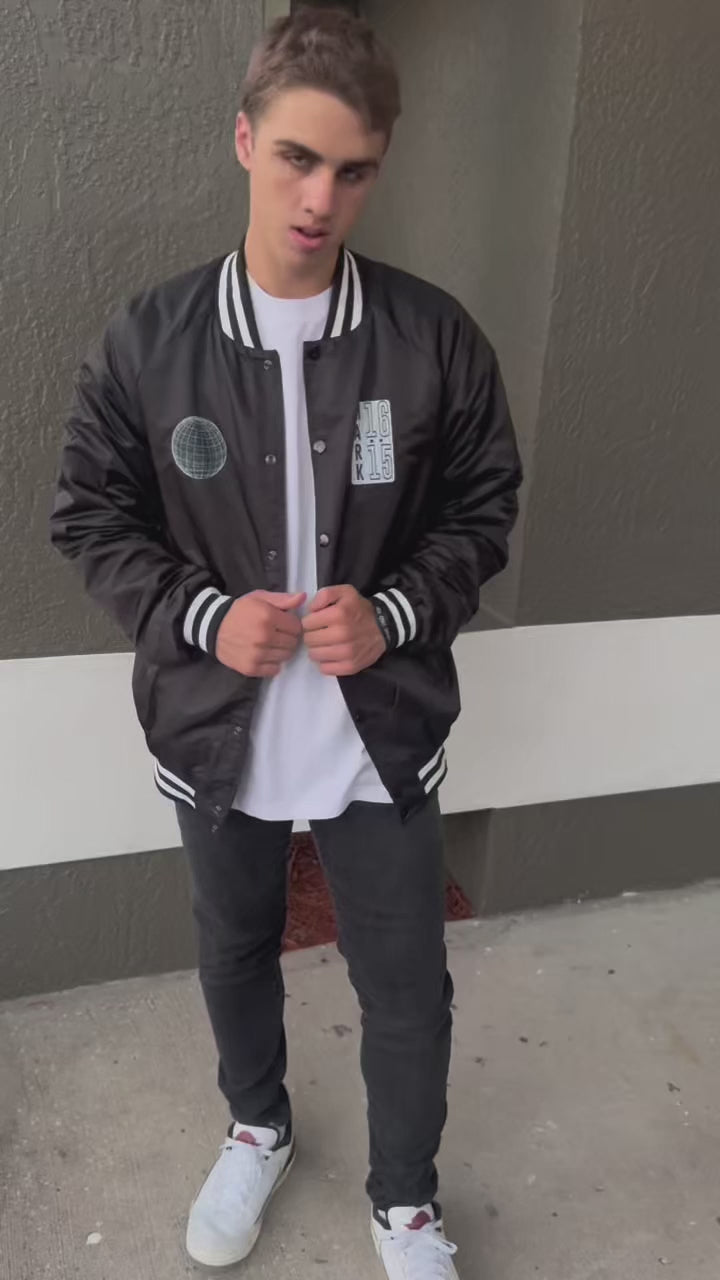 INTO THE WORLD VARSITY BOMBER JACKET